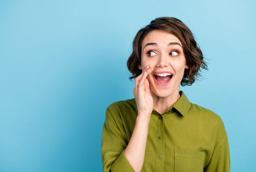 Woman telling secret